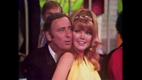 Dick Martin and Pamela Rodgers in Rowan & Martin's Laugh-In (1967)