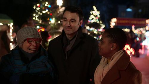 Still of Jon Welch, Bénédicte Bélizaire and Trudy Weiss in Candy Cane Christmas (2020)