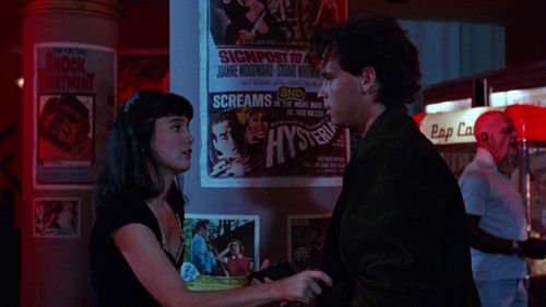 Derek Rydall and Jill Schoelen in Popcorn (1991)