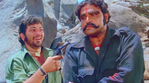 Amjad Khan and Viju Khote in Sholay (1975)