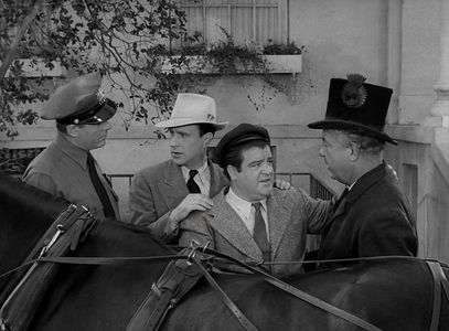 Bud Abbott, Lou Costello, James Flavin, and Cecil Kellaway in It Ain't Hay (1943)