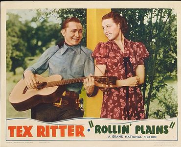 Harriet Bennet and Tex Ritter in Rollin' Plains (1938)