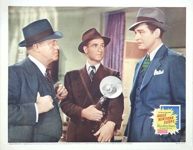 Chick Chandler, Cliff Clark, and Michael Whalen in While New York Sleeps (1938)