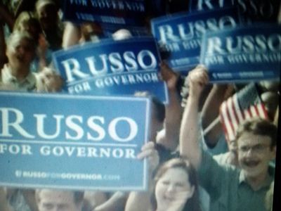 House of Cards, Season 1, Episode 9, Supporter at rally for Russo for Governor!