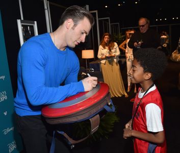 Chris Evans and Miles Brown at an event for Captain America: Civil War (2016)
