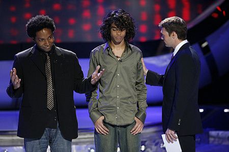 Ryan Seacrest and Sanjaya Malakar in American Idol (2002)