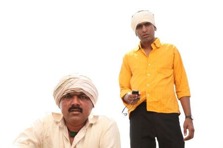 Makarand Anaspure and Sandeep Pathak in Rangaa Patangaa (2015)