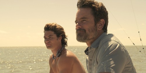 Charles Esten and Chase Stokes in Outer Banks (2020)