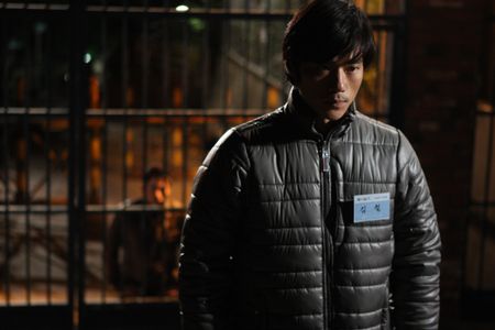 Kang-woo Kim in A Better Tomorrow (2010)