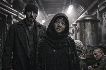 Chris Evans and Ko Asung in Snowpiercer (2013)