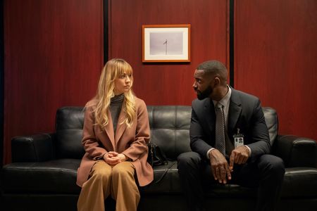 Kaley Cuoco and Mo McRae in The Flight Attendant: Seeing Double (2022)