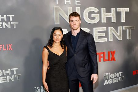 Gabriel Basso and Luciane Buchanan at an event for The Night Agent (2023)