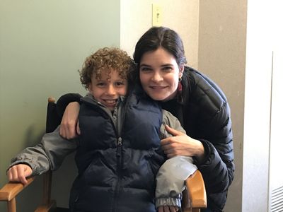 Isaak Bailey with Betsy Brandt on set for Flint.