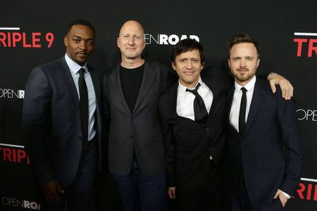 Clifton Collins Jr., John Hillcoat, Aaron Paul, and Anthony Mackie at an event for Triple 9 (2016)