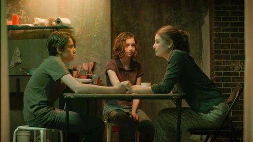 Stefanie Scott, Emma Myers, and Braxton Bjerken in Girl in the Basement (2021)