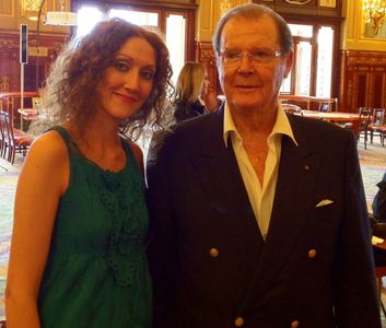 Actress Charlotte Milchard and actor Sir Roger Moore at Casino Royale during the 53rd Monte Carlo TV Festival in Monaco.