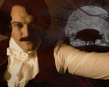 As Edgar Allan Poe in The Raven