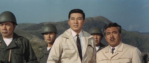Mitsuo Tsuda, Yoshifumi Tajima, Akira Takarada, and Jun Tazaki in Invasion of Astro-Monster (1965)