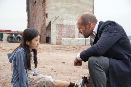Jason Statham and Catherine Chan in Safe (2012)