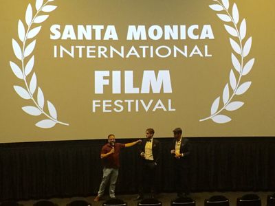 Tyler Atkins and Drue Metz accepting The Grand Jury Prize for their film The Love Effect.