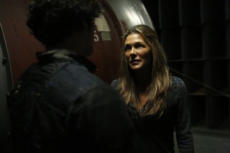 Paige Turco and Bob Morley in The 100 (2014)