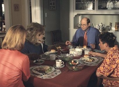 Beary (center left) breaks bread with his overbearing family - his mother (Meagen Fay, left), father (Stephen Tobolowsky