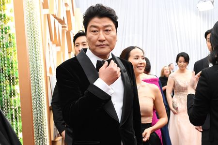 Song Kang-ho and Cho Yeo-jeong at an event for The Oscars (2020)