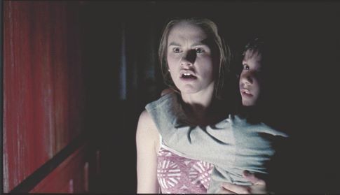 Anna Paquin and Stephan Enquist in Darkness (2002)