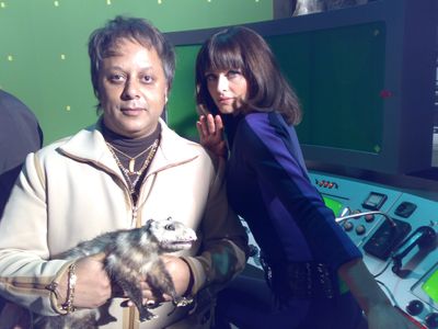 Kammy Darweish as Mega Villain on the set of Capital One's 'Mega Villain' TV Commercial (with Jess Murphy and 'Reggie th