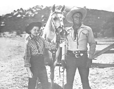 Buster Crabbe, Janet Warren, and Falcon in Wild Horse Phantom (1944)