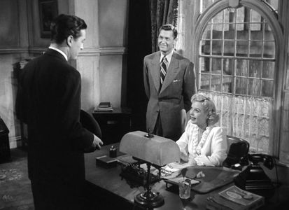 Ray Milland, Carl Esmond, and Marjorie Reynolds in Ministry of Fear (1944)