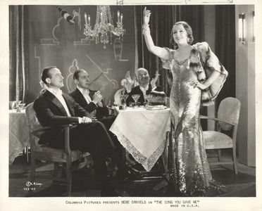 Bebe Daniels, Frederick Lloyd, Lester Matthews, and Victor Varconi in The Song You Gave Me (1934)