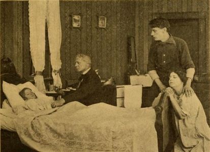 George Morgan, Louise Vale, and Mimi Yvonne in The Blacksmith's Story (1913)