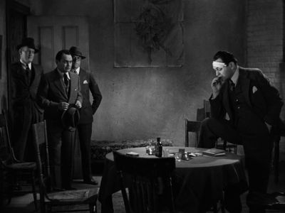 Edward G. Robinson, Joe Sawyer, and John Wray in The Whole Town's Talking (1935)