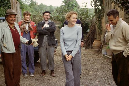 Frances (Diane Lane, second from right) experiences the agony and the ecstasy of remodeling her Tuscan villa with the he