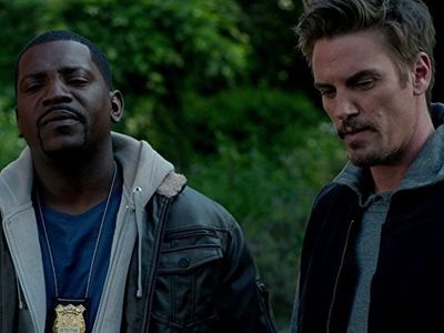 Mekhi Phifer and Riley Smith in Frequency (2016)