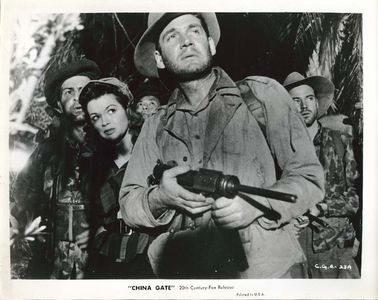 Angie Dickinson, Gene Barry, Paul Busch, and George Givot in China Gate (1957)