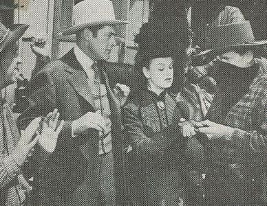 Ray Bennett, Jean Stevens, Charles Starrett, and Britt Wood in The Return of the Durango Kid (1945)