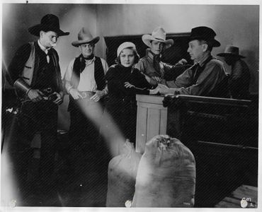 Yakima Canutt, Peggy Djarling, Franklyn Farnum, Fred Parker, and Hal Taliaferro in Carrying the Mail (1934)