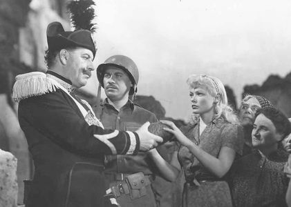 Gene Tierney, Fortunio Bonanova, and John Hodiak in A Bell for Adano (1945)
