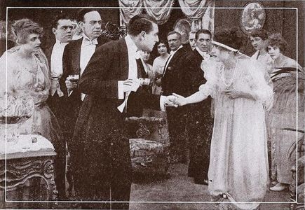Marguerite Courtot and Crauford Kent in The Pretenders (1915)
