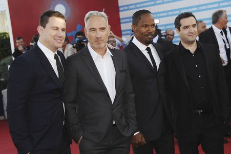 (L-R) Actor Channing Tatum, director Roland Emmerich, actor Jamie Foxx and producer Brad Fischer arrive at the premiere 