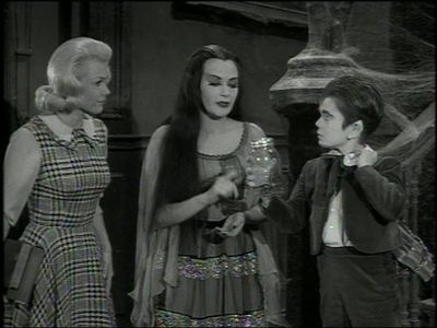 Yvonne De Carlo, Butch Patrick, and Pat Priest in The Munsters (1964)