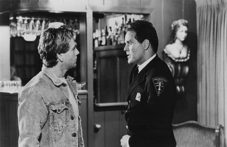 Wings Hauser and Ryan O'Neal in Tough Guys Don't Dance (1987)