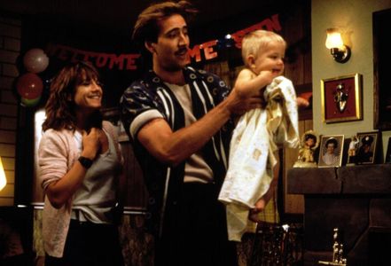Nicolas Cage, Holly Hunter, and T.J. Kuhn in Raising Arizona (1987)