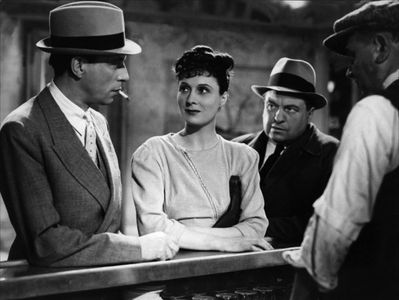 Arletty, Louis Jouvet, and Armand Lurville in Hotel du Nord (1938)