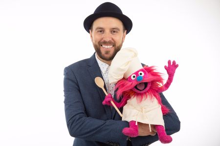Warrick Brownlow-Pike with Sesame Street's Gonger