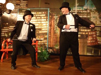 Mitch (actor Ross Munro) and Dunc (actor Robert David Duncan) dance in a Hollywood musical fantasy.