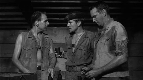 Tom Courtenay, Arthur Malet, and Gerald Sim in King Rat (1965)