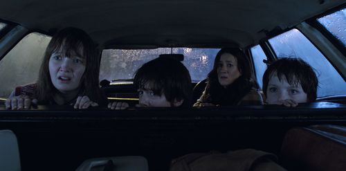 Maria Doyle Kennedy, Lauren Esposito, Benjamin Haigh, and Patrick McAuley in The Conjuring 2 (2016)